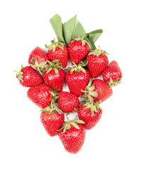 Big strawberry shape  made of fresh organic berries