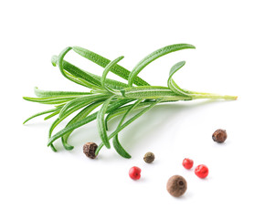 rosemary and pepper on white background