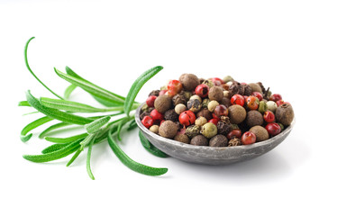 rosemary and pepper on white background