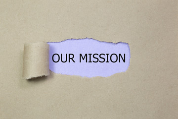 Our Mission message written under torn Brown paper