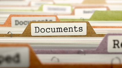 Documents on Business Folder in Multicolor Card Index. Closeup View. Blurred Image. 3D Render.