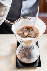barista making coffee