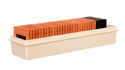 Box with framed slides isolated over white