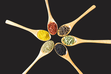 Spices on black background