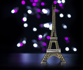 Eiffel tower shot in studio with bokeh lights in backgound