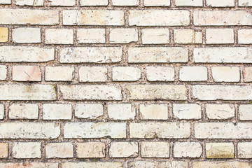 Grunge old brown brick wall background.