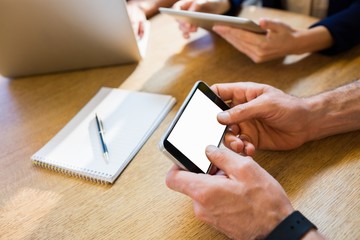 Colleagues using technology