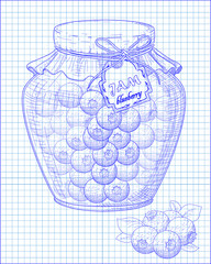 beautiful jar of homemade jam with blueberry on a notebook backg