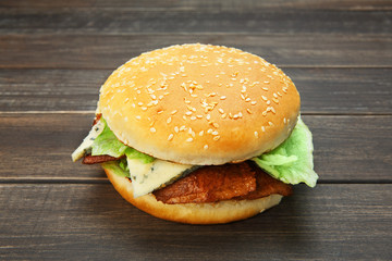 Meet and cheese burger at rustic wood