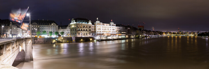 Fototapeta na wymiar Panoramic view of Basel city center, the middle bridge (Mittlere Bruecke) and the Rhine river.
