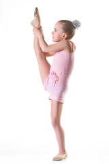 Girl doing gymnastic exercises or exercising on white background