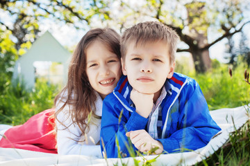 sister and brother on a picnic