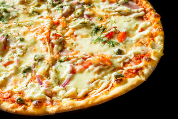 Pizza with bacon close up isolated on black background
