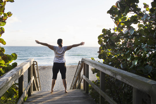 Mature woman exercising on walkway, Juno Beach, Florida, USA