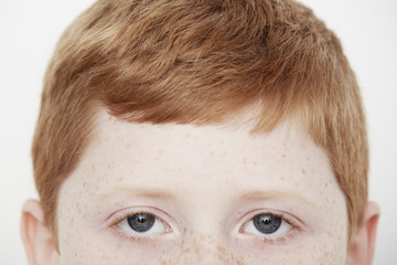 Boy with freckles, focus on eyes