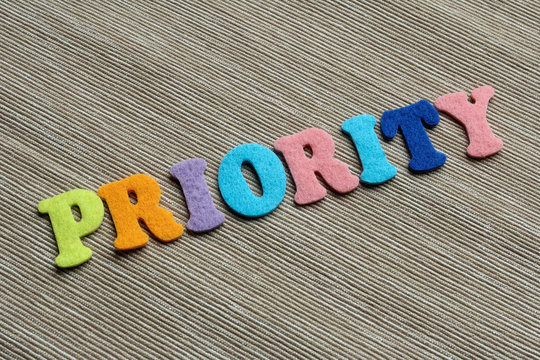 priority word made with colorful felt letters