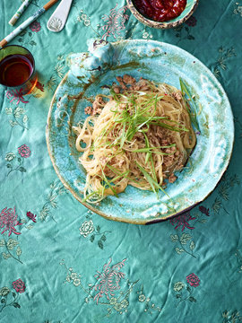 Still life of bowl with stir fry pork mince and noodles