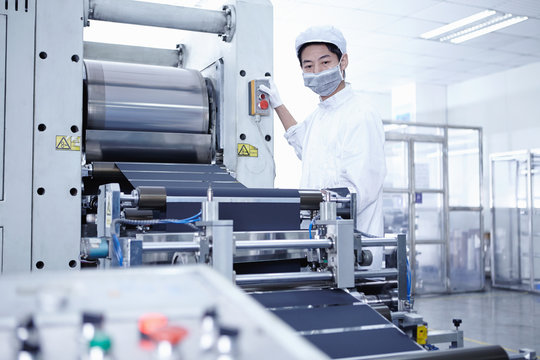 Worker at e-cigarettes battery factory, Guangdong, China
