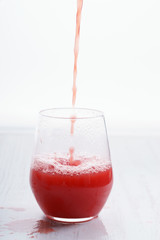 Healthy watermelon drink pouring