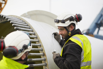 Engineers working on wind turbine