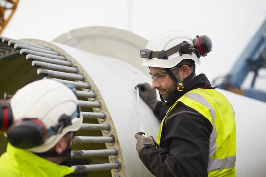 Engineers working on wind turbine
