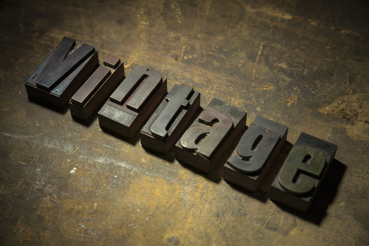 Letterpress letters spelling the word Vintage