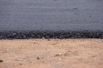 Close-up asphalt at road under construction