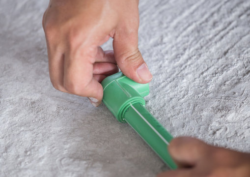 PPR plumbing pipe connection on hands.