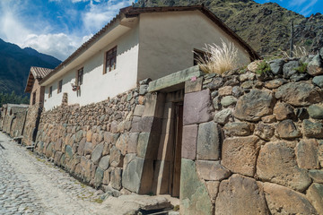 Fototapeta na wymiar One of ancient alleys of Ollantaytambo village, Sacred Valley of Incas, Peru