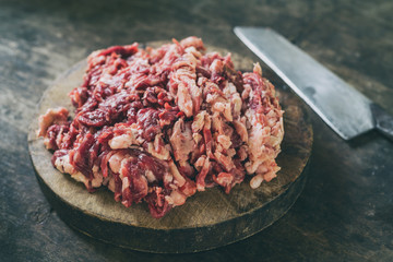 Shredded beef on cutting board