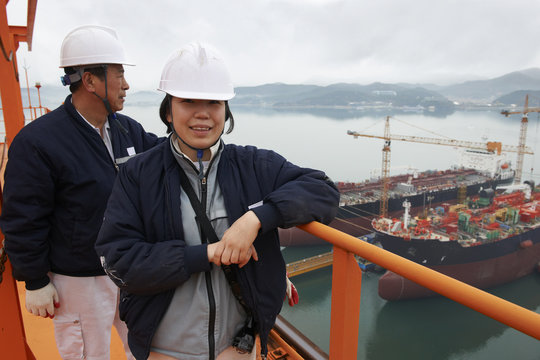 Portrait of workers at shipping port, GoSeong-gun, South Korea