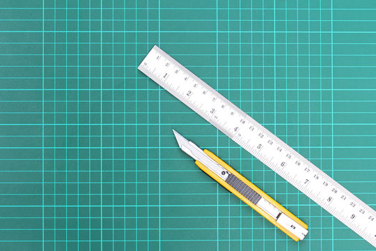 Cutter and metal ruler