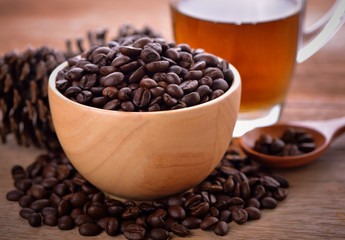  coffee beans on wooden background