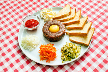 tartare meat with egg yolk