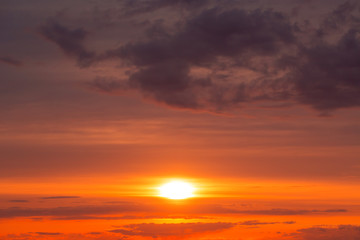 Fiery orange sunset sky. Beautiful sky background.