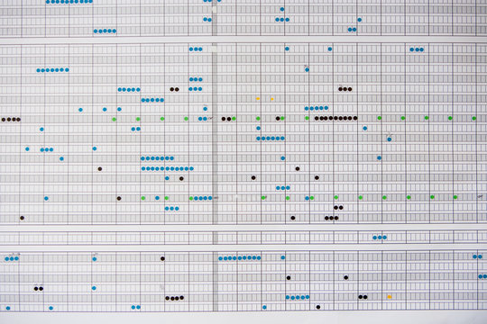 Wall planner covered with stickers