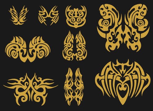 Gold tribal tattoo on a dark background . Gold illustration without transparency.