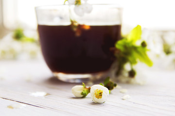 cup of coffee with spring flowers

