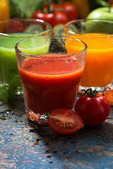 assortment of vegetable juices, vertical