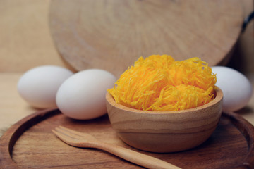 gold egg yolks thread (angel hair), Thai dessert made from duck egg, Low-key natural light