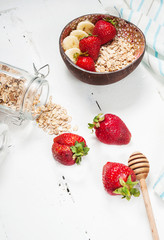 Healthy breakfast with cereals, banana and strawberry