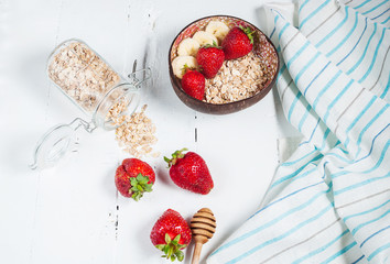 Healthy breakfast with cereals, banana and strawberry