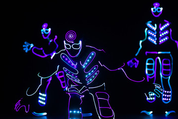 Fototapety  zespół taneczny w strojach LED