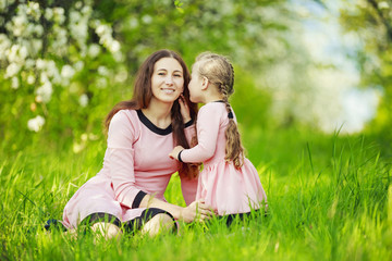 Fototapeta premium Mom with baby garden