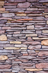 Old stone brick wall background.