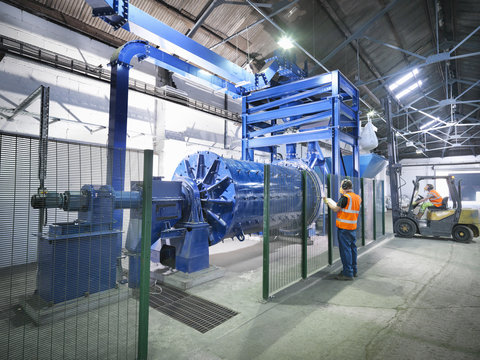 Workers In Metal Ore Grinding Mill