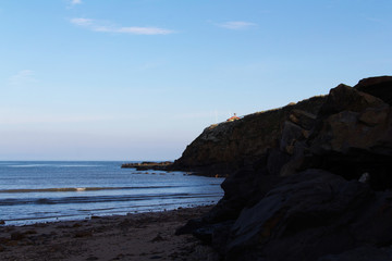 Fototapeta na wymiar Sand and sea on the seafront at Bude, Cornwall