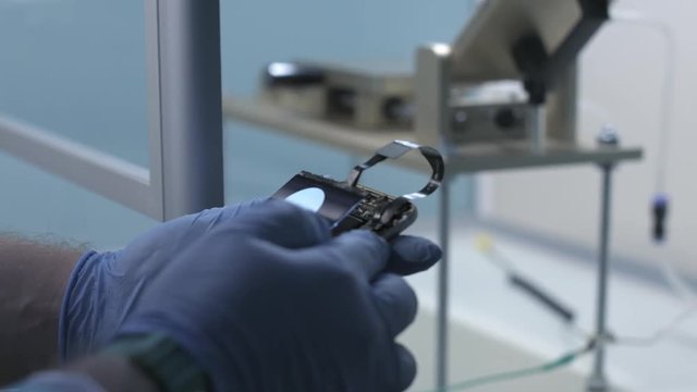 Check disassembled smartphone display and accelerometer performance. Repair smart phone.