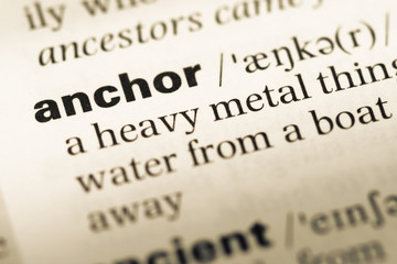 Close up of old English dictionary page with word anchor © TungCheung