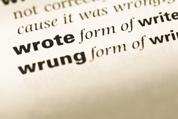 Fototapeta premium Close up of old English dictionary page with word wrote